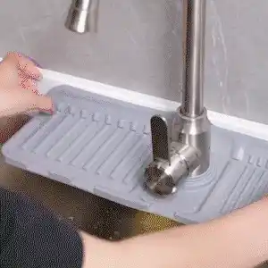Silicone mat being rolled up